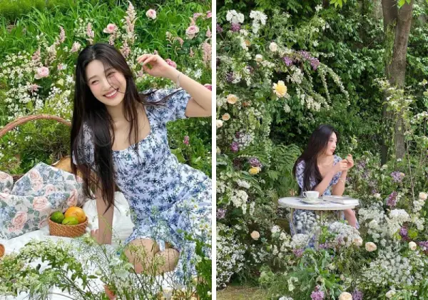 Tạo dáng chụp ảnh đứng ngoài trời với hoa