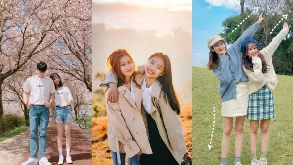 Nắm tay nhau và cùng cười thật tươi về phía máy ảnh